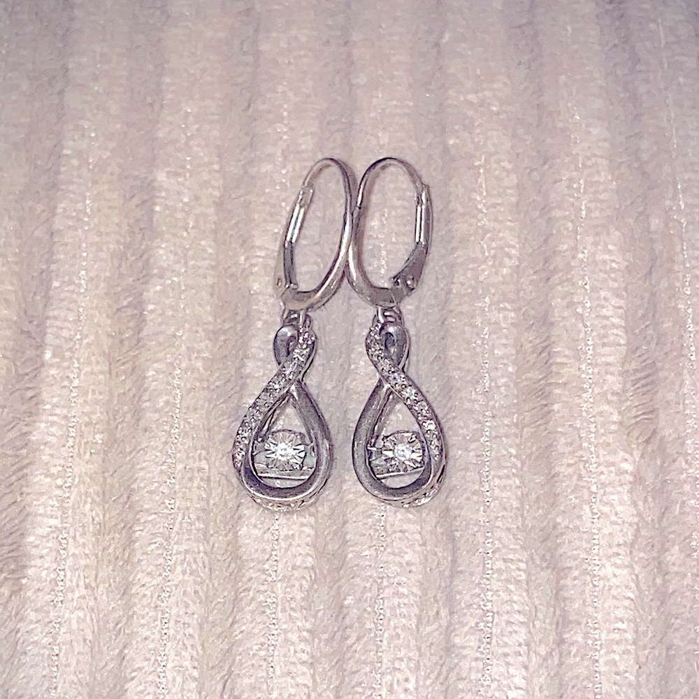 Sterling Silver Earrings with floating diamonds.